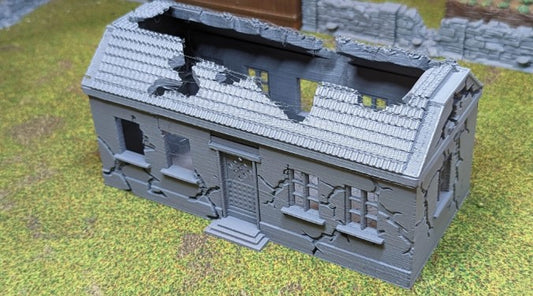 Destroyed house with removable roof